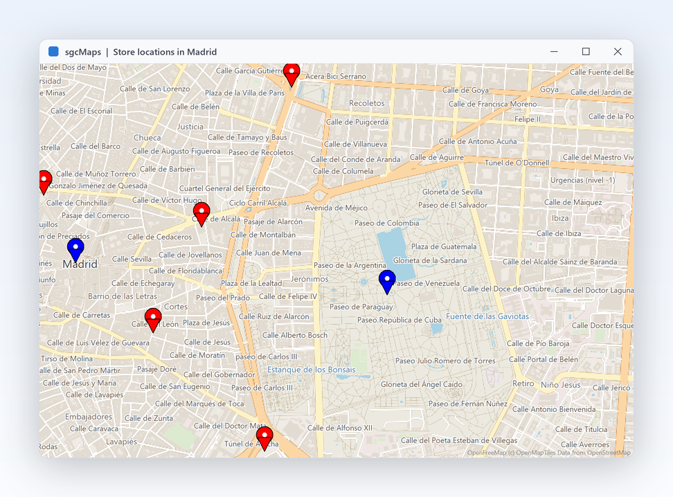 TsgcVCLMap pokazujący centrum Madrytu z kafelków wektorowych z czerwonymi i niebieskimi znacznikami lokalizacji